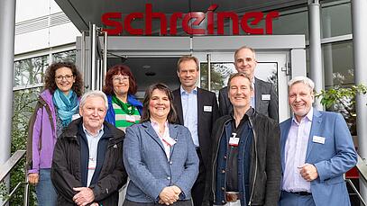 Gruppenbild mit Claudia Köhler, Markus Büchler und der Schreiner Group